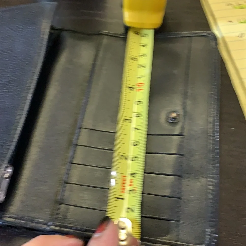 Longchamp black leather folding wallet‎